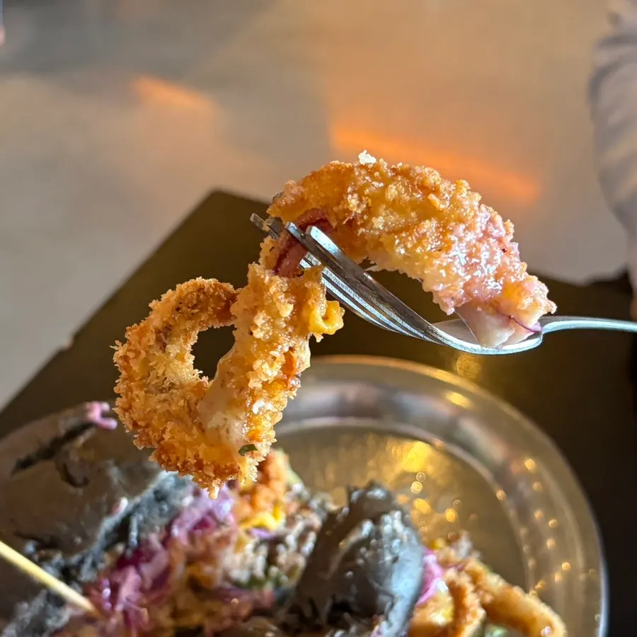 Jumunjin squid burger on a squid-ink bun