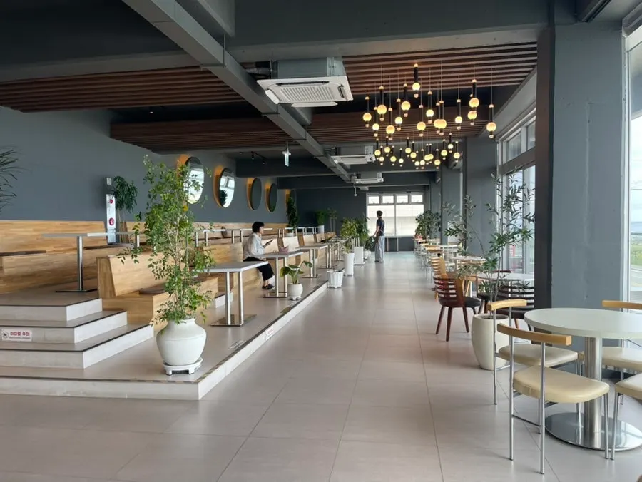 Baegya Coffee seating with an ocean view