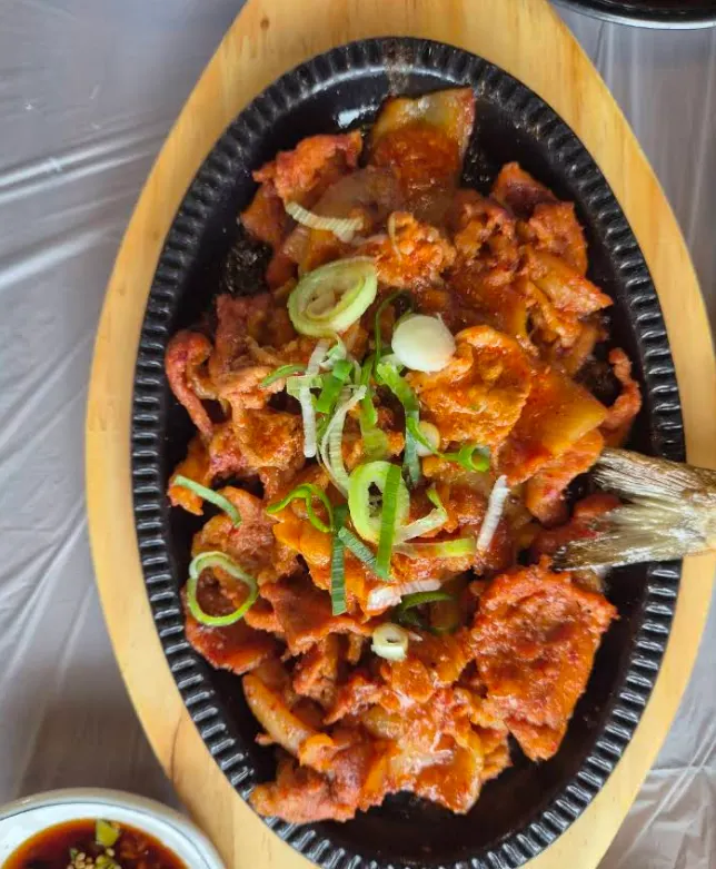 Plate of stir-fried pork as a main side dish