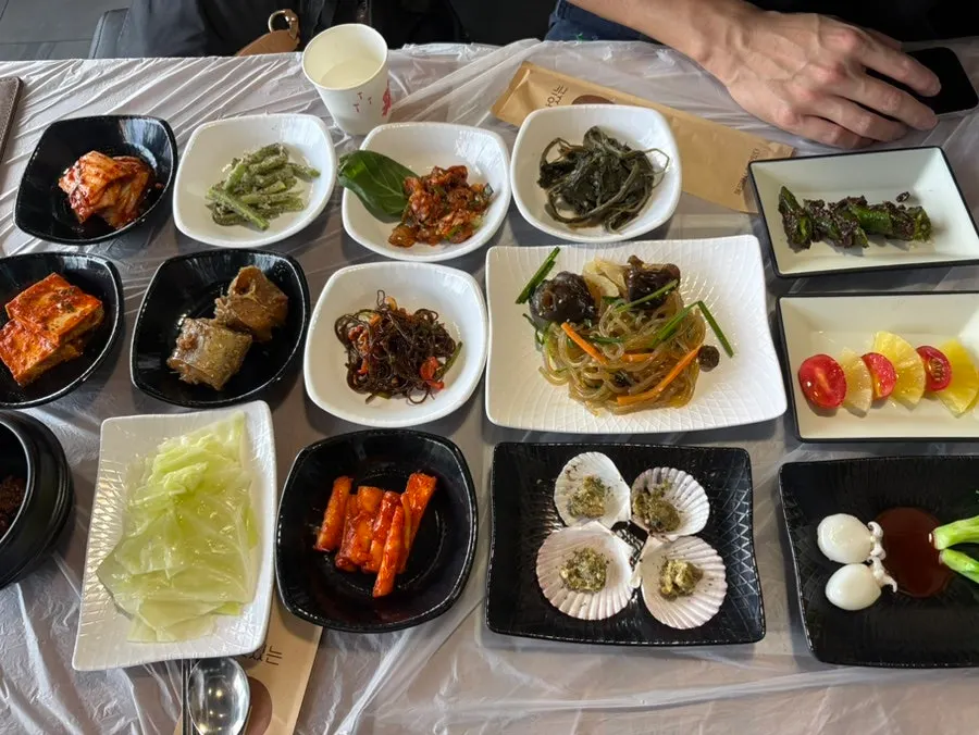 Plate of seasoned namul and seasoned chili peppers