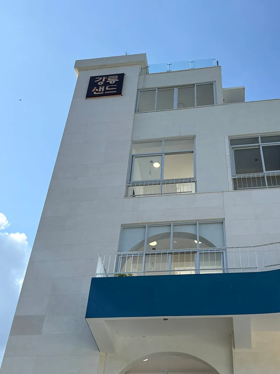 White Santorini-style building housing Gangneung Sand Main Branch