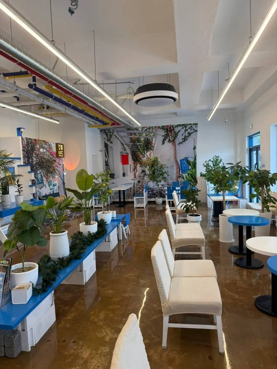 Interior of the 2nd-floor café at Gangneung Sand Main Branch with landscaping
