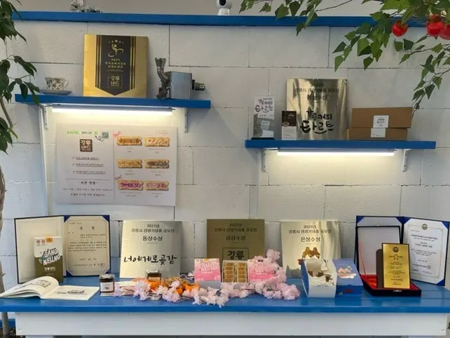 Wall covered in Gangneung Sand award certificates