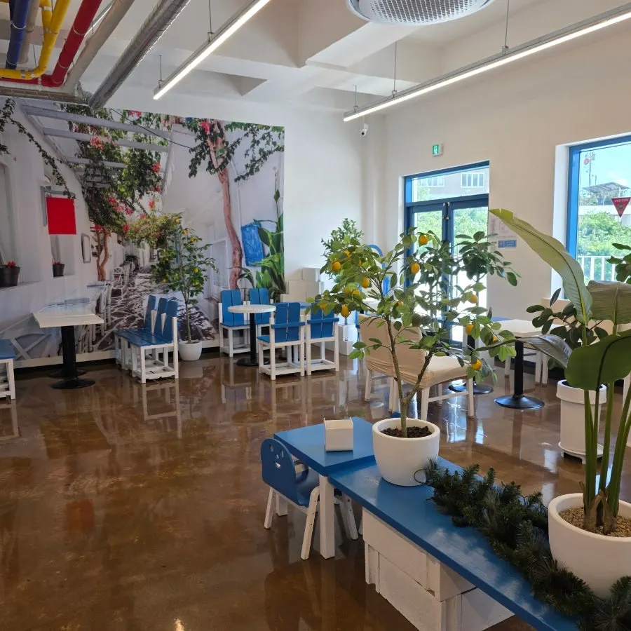 Second-floor shop interior with a Santorini feel