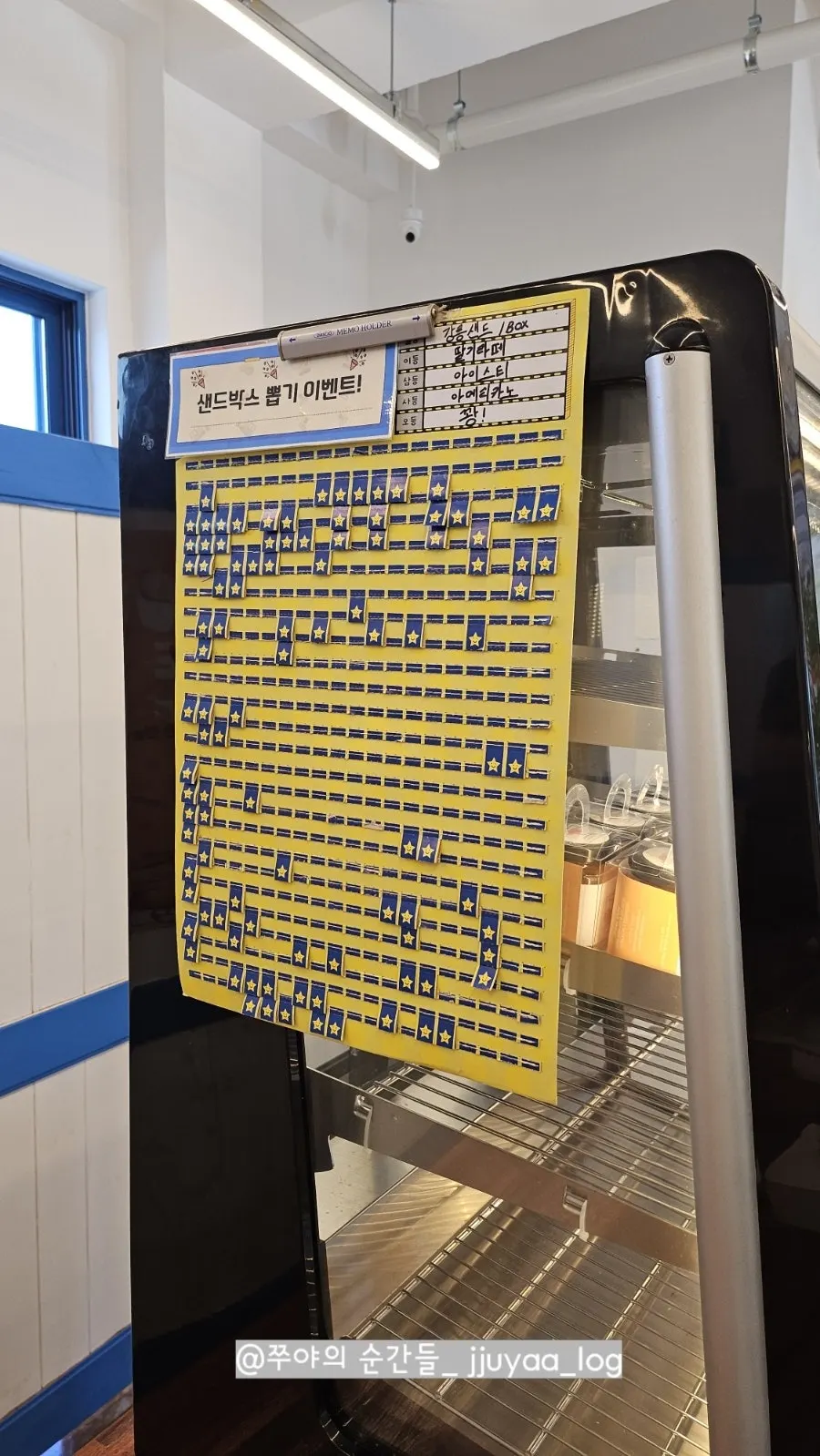 Capsule prize board next to the 2nd floor counter