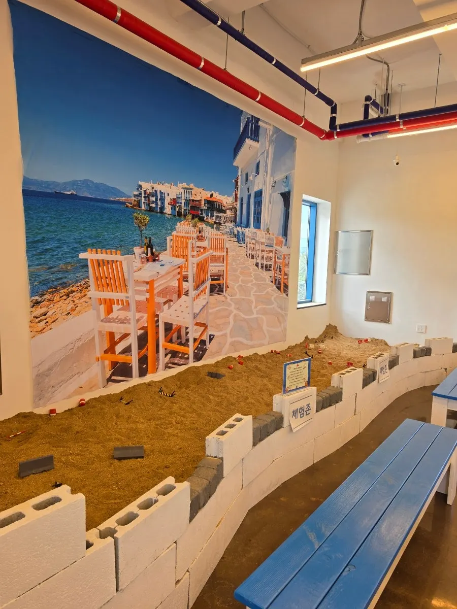 Interior of the sandbox play zone where kids can play