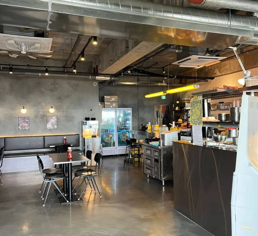 Indoor tables at Burger Bar with generous spacing