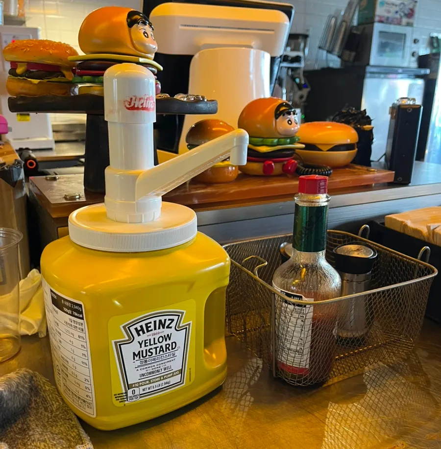 Open kitchen cooking scene at Burger Bar