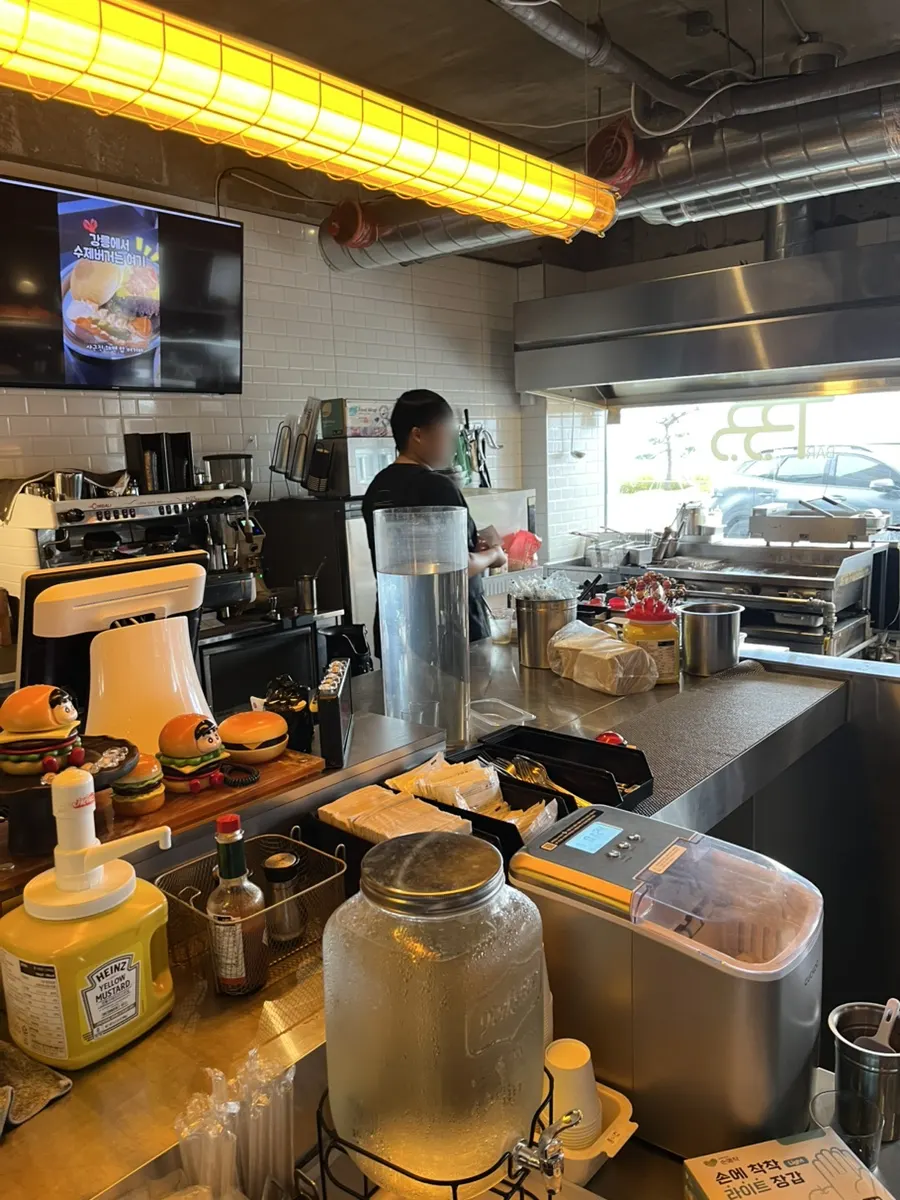 Wet wipes and ketchup at Burger Bar's self-serve bar