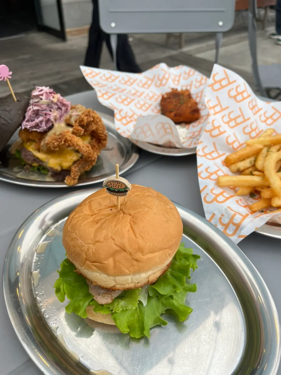 Freshly made burger set served at an outdoor table