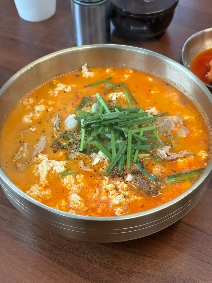 Close-up of tofu-packed sogol sundubu