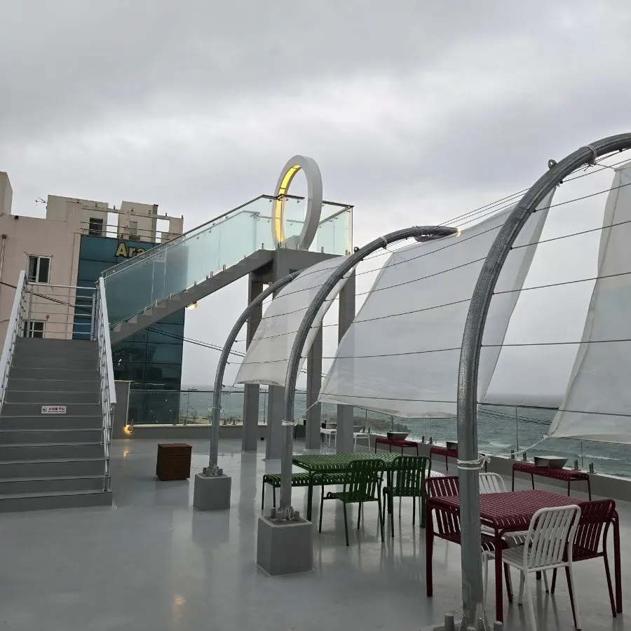 Rooftop area with tables and chairs