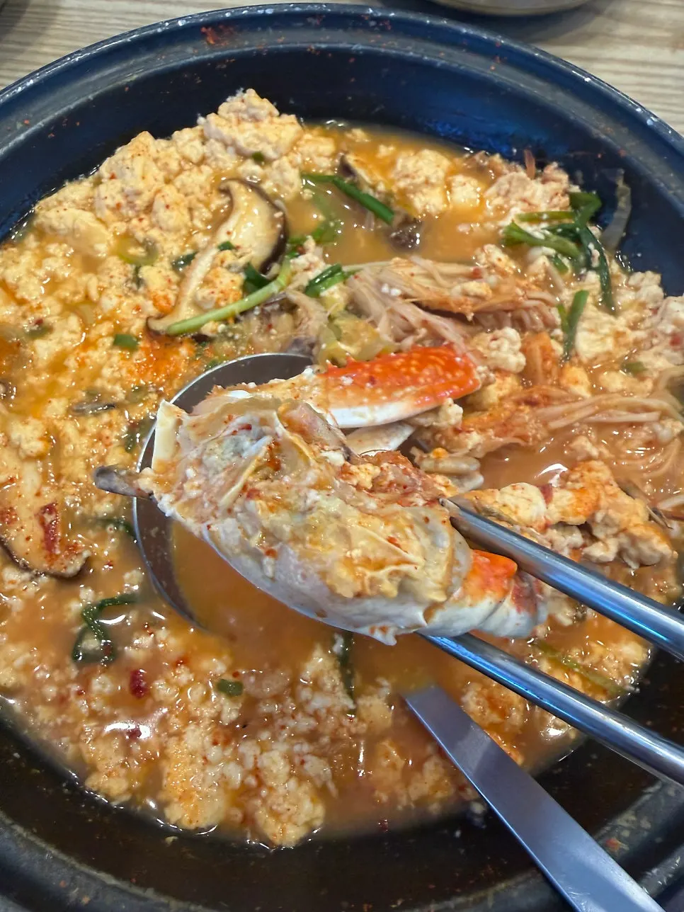 Soft tofu hot pot with blue crab and vegetables