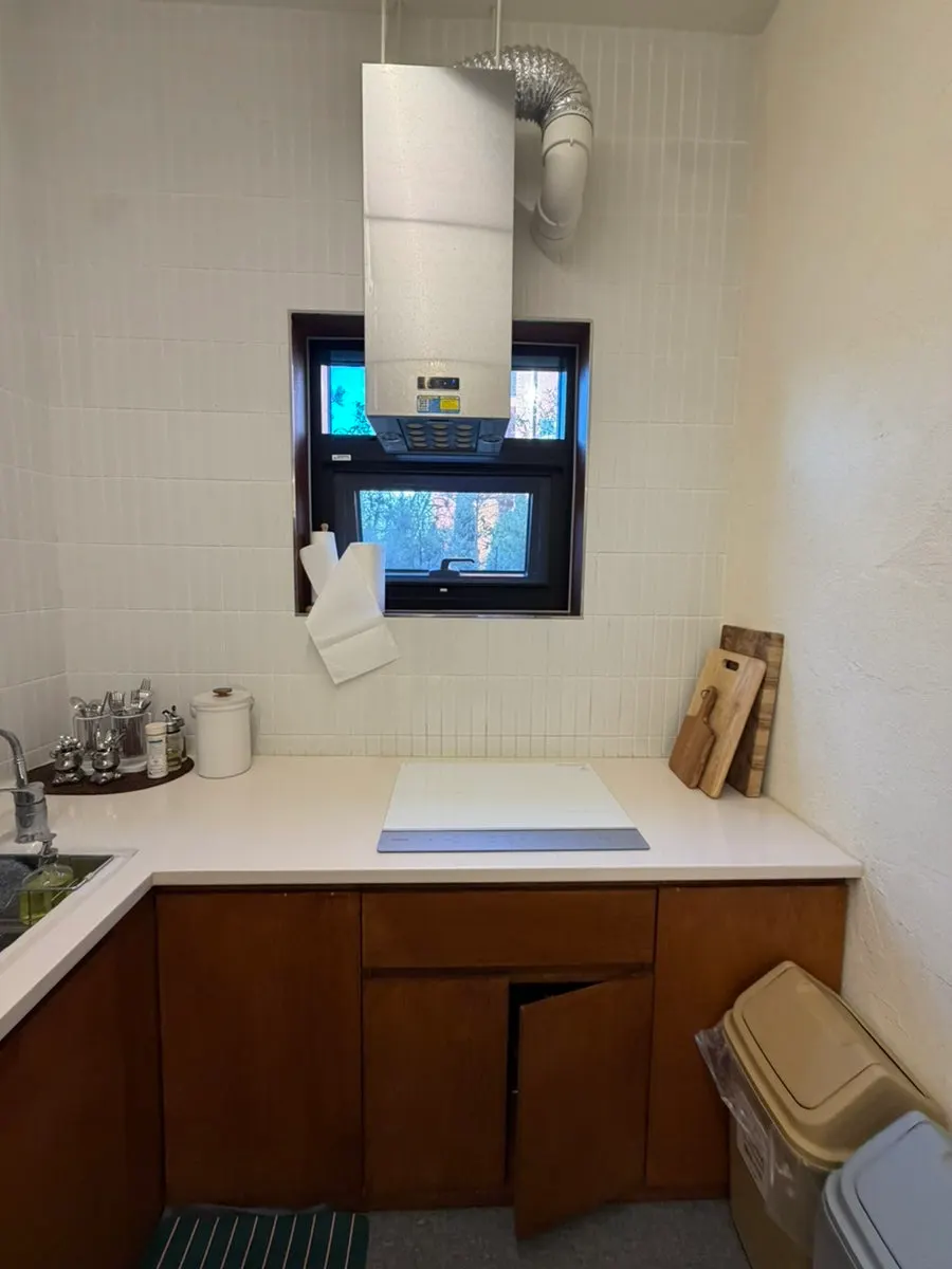 1st floor kitchen with induction stove and cookware