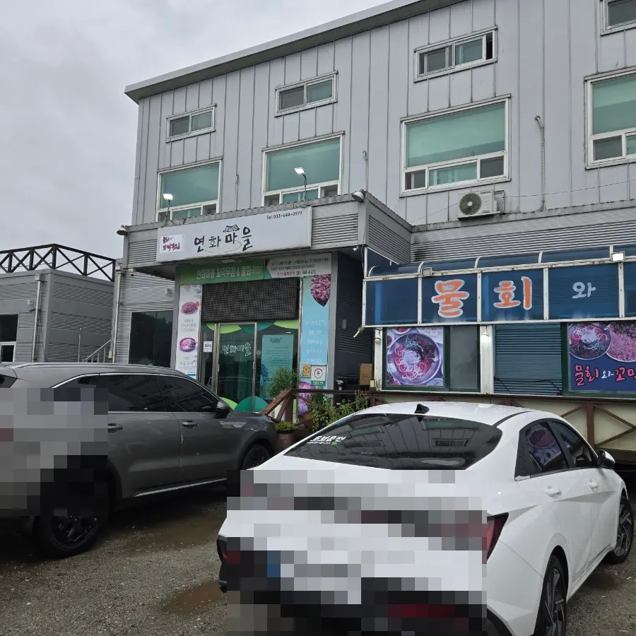 Exterior view showing the spacious store and parking area