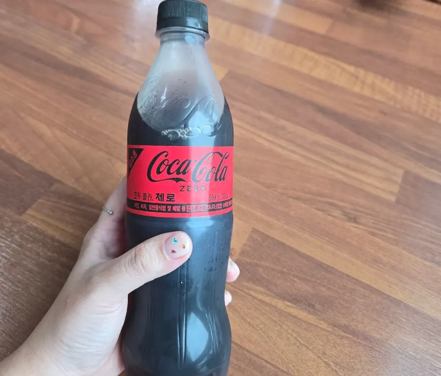 Cola served in a 500ml bottle