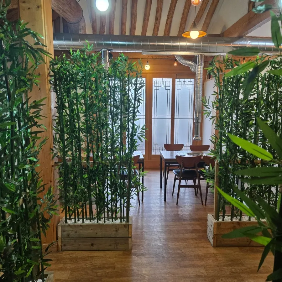 Hanok-style interior with wooden pillars