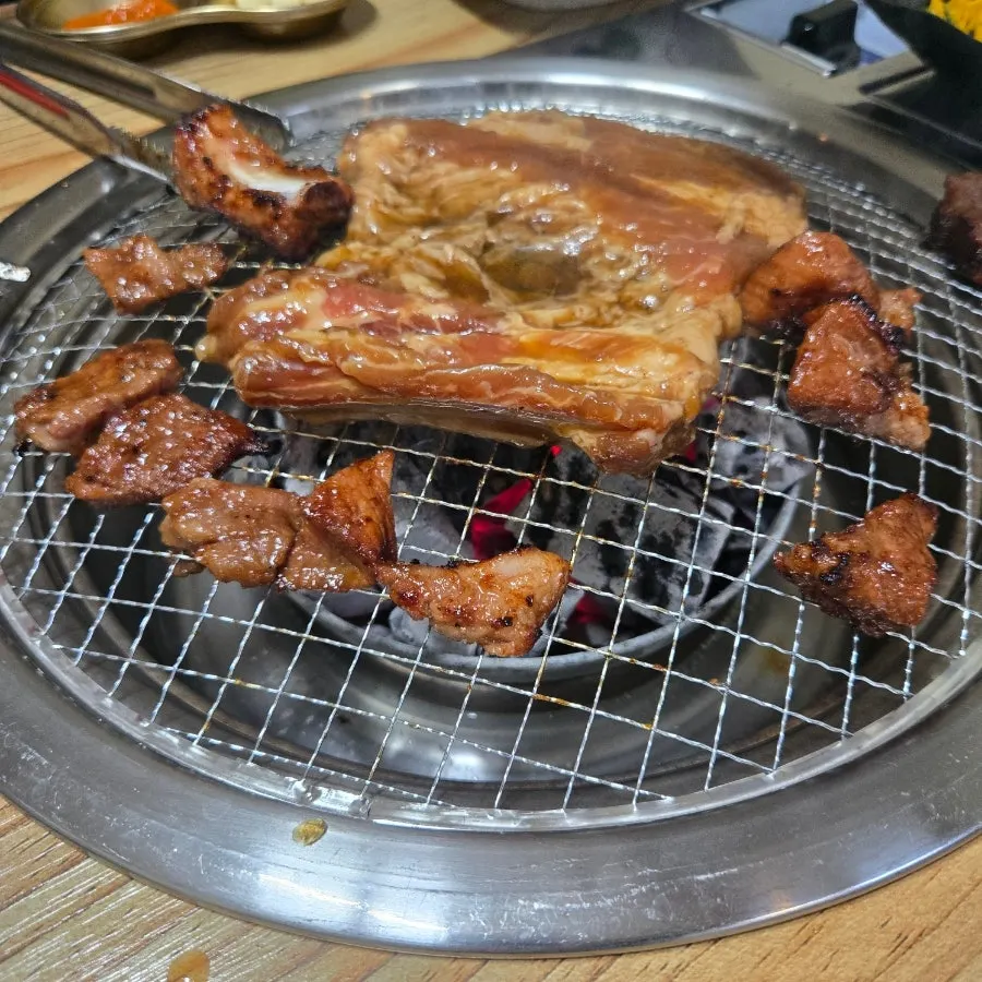 Charcoal-grilled marinated pork ribs before grilling