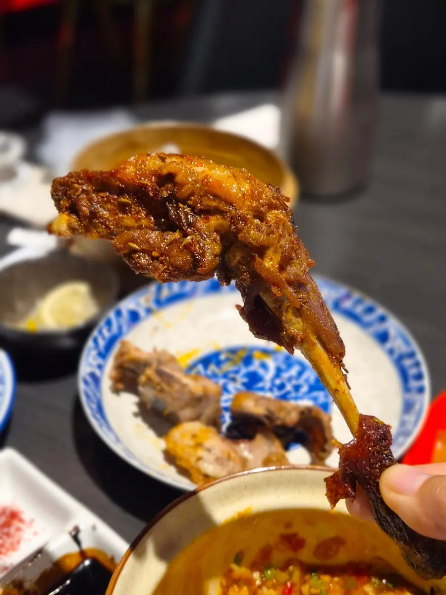 Fried Peking duck bone chips with a hint of cumin