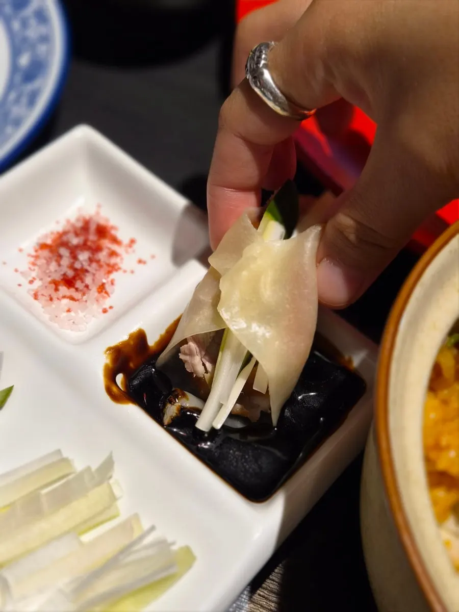 Peking duck paired with the spicy eggplant rice bowl