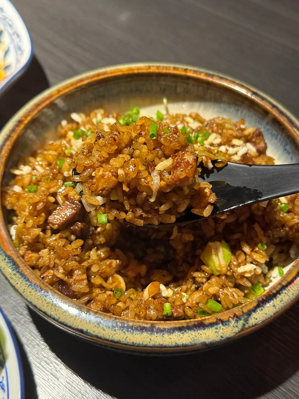 Close-up of fried rice with rice crackers mixed in