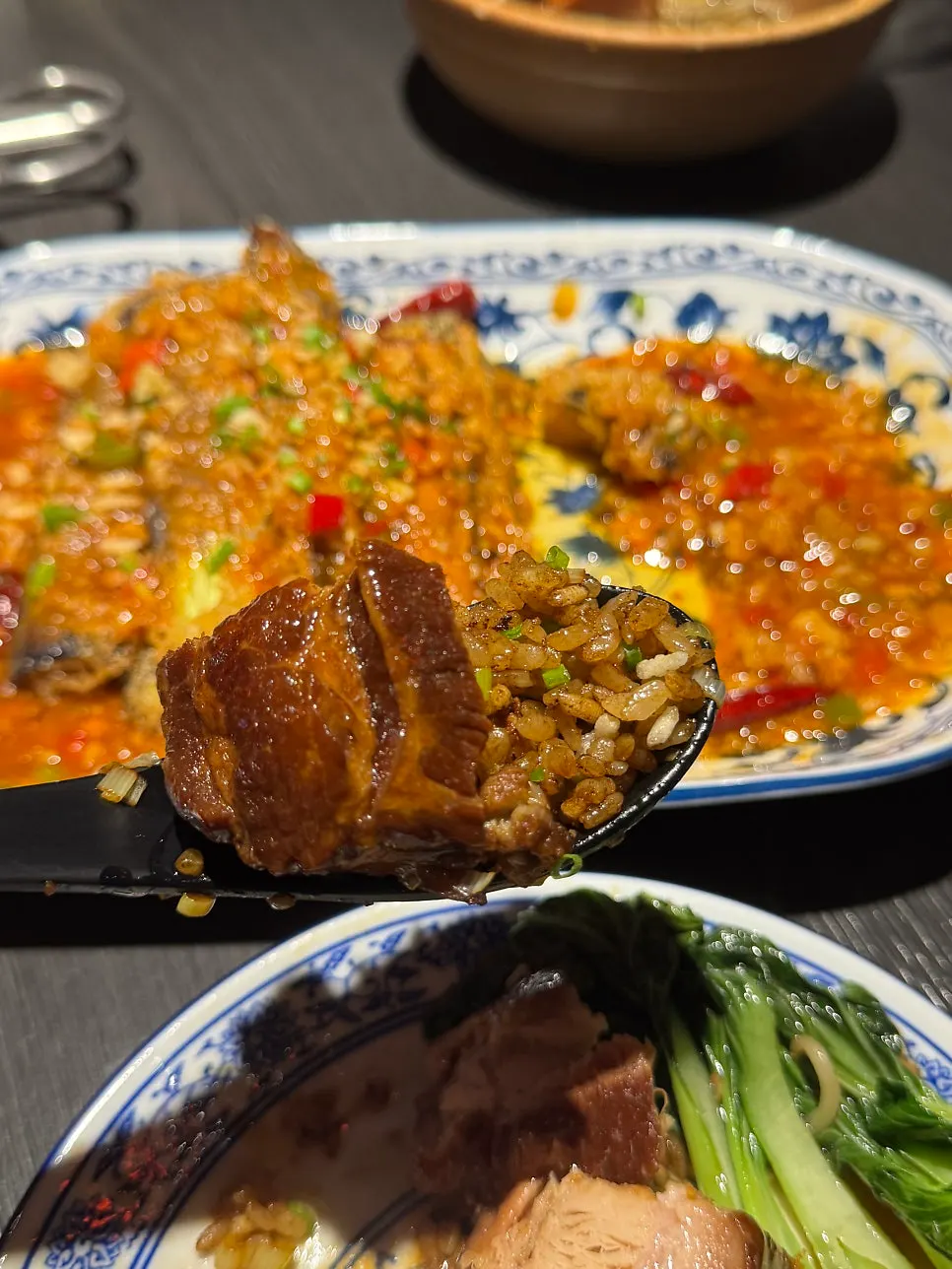 A spoonful of Peking duck fried rice