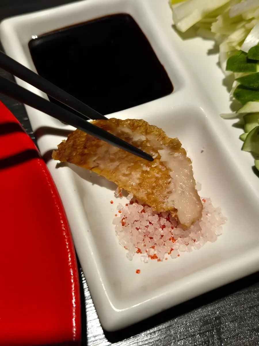 Half Peking duck arranged in a flower shape