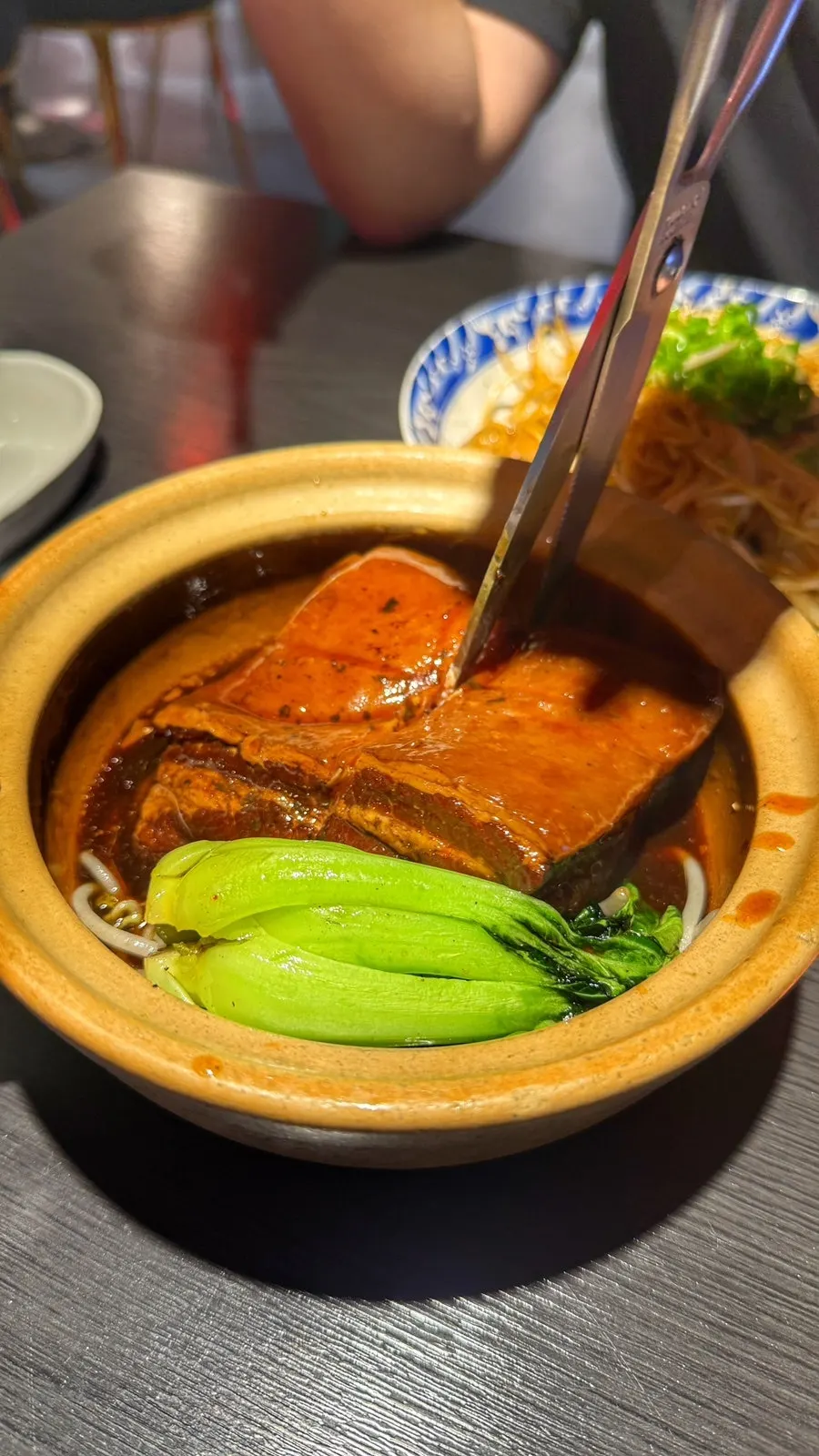 A piece of dongpo-yuk soaked in sauce