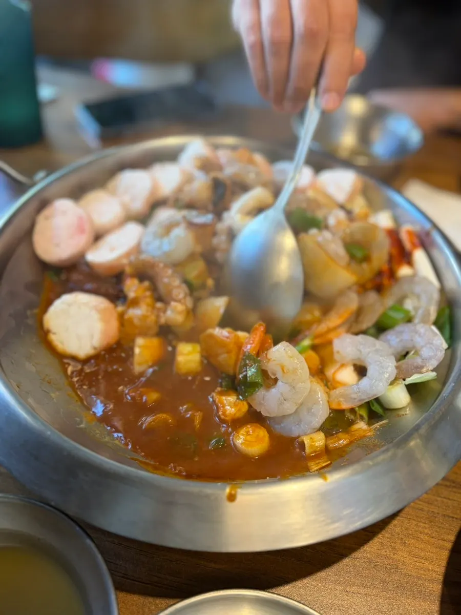 Pot filled with nakgopsae ingredients