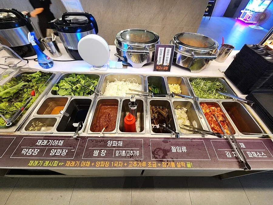 Menu board showing all-you-can-eat price tiers