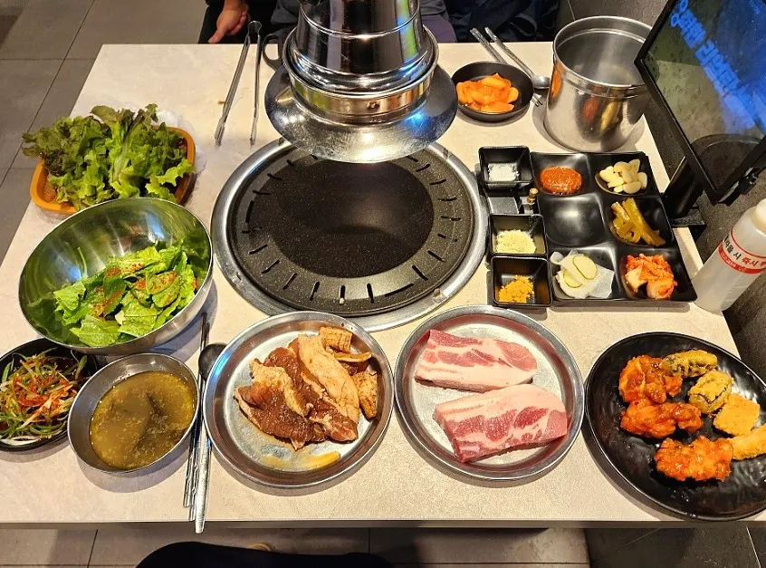 Table filled with side dishes and sauces
