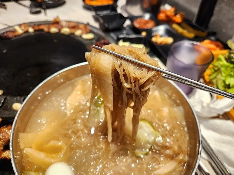 Dessert naengmyeon with quail egg and icy broth