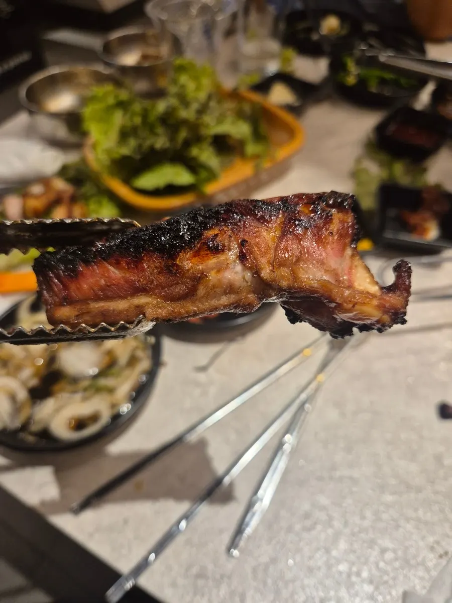 Pork ribs cooking on the square grill plate