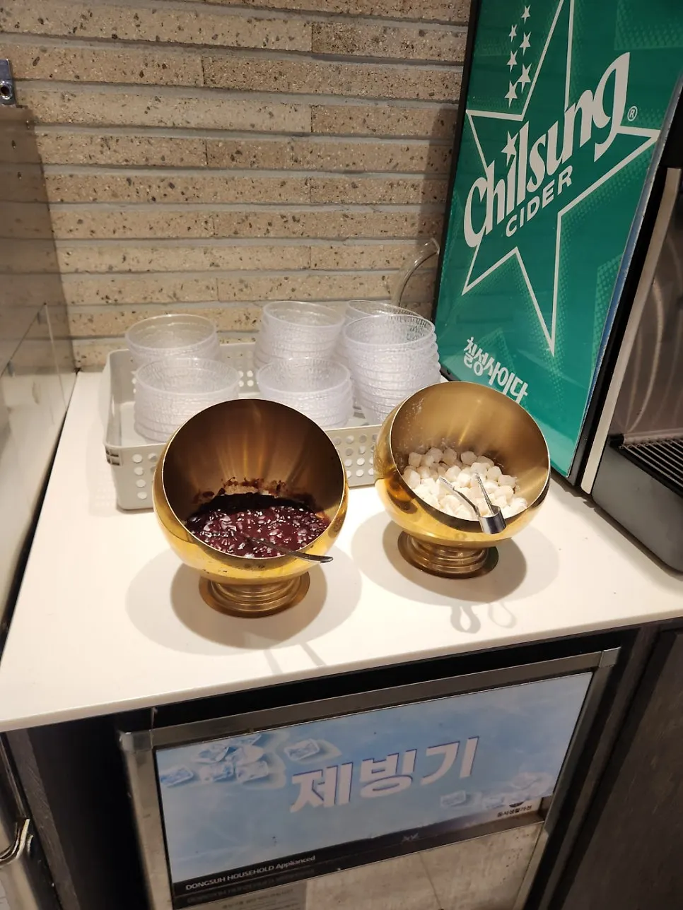 Ramyeon corner at the Gankeun Galbi self-bar with various add-ins