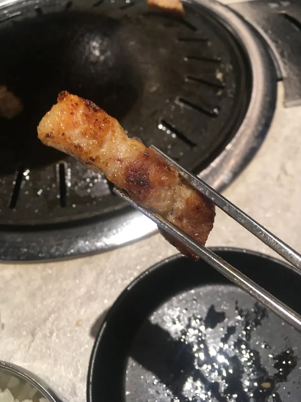Close-up of well-grilled pork belly