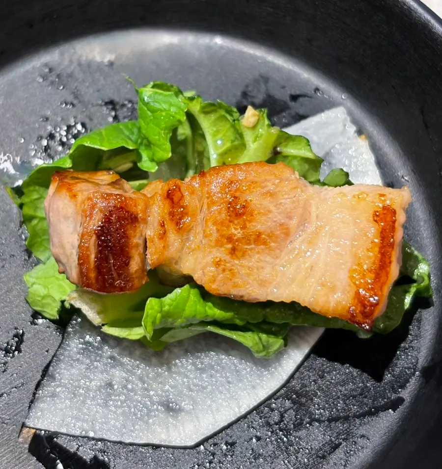 Pork belly grilled golden-brown on the charcoal plate