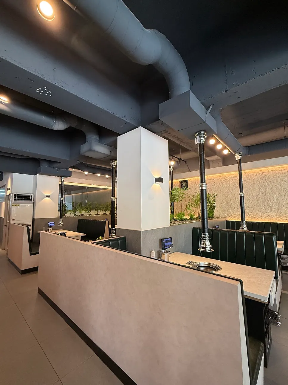 Window seat with a full window wall at Gankeun Galbi Seongseo Branch