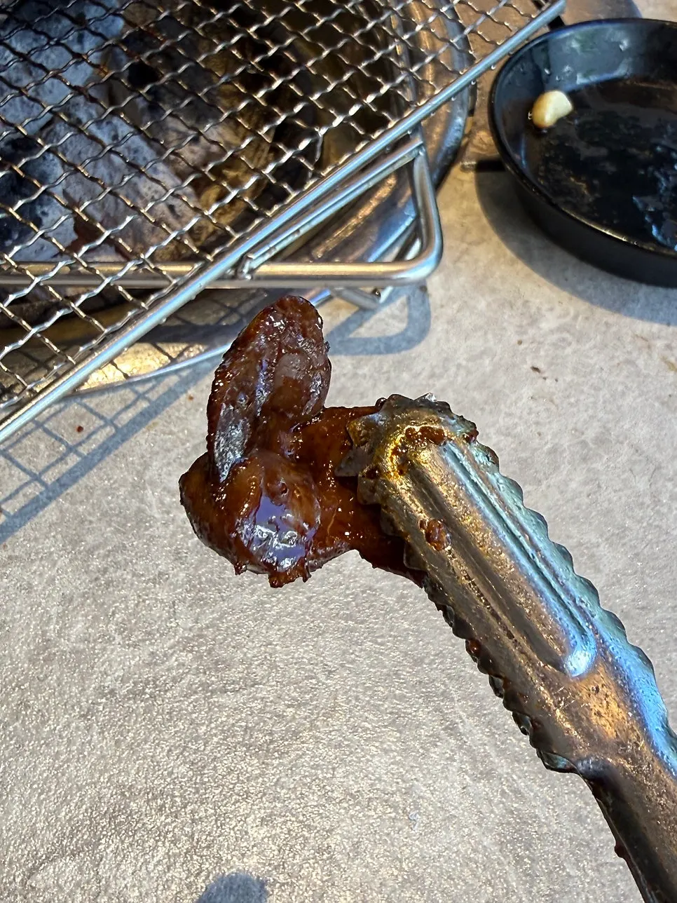 Grilled pork ribs still on the bone