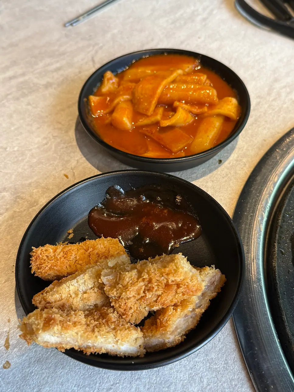 Plate of self-bar pork cutlet and tteokbokki