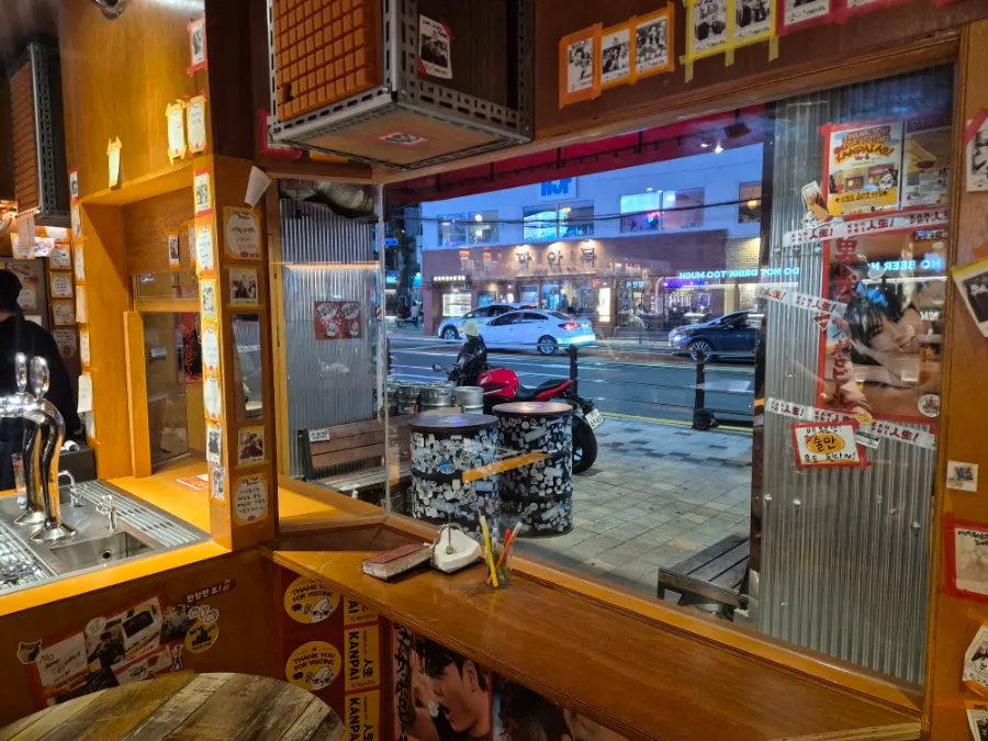 Interior of the standing bar packed with customers