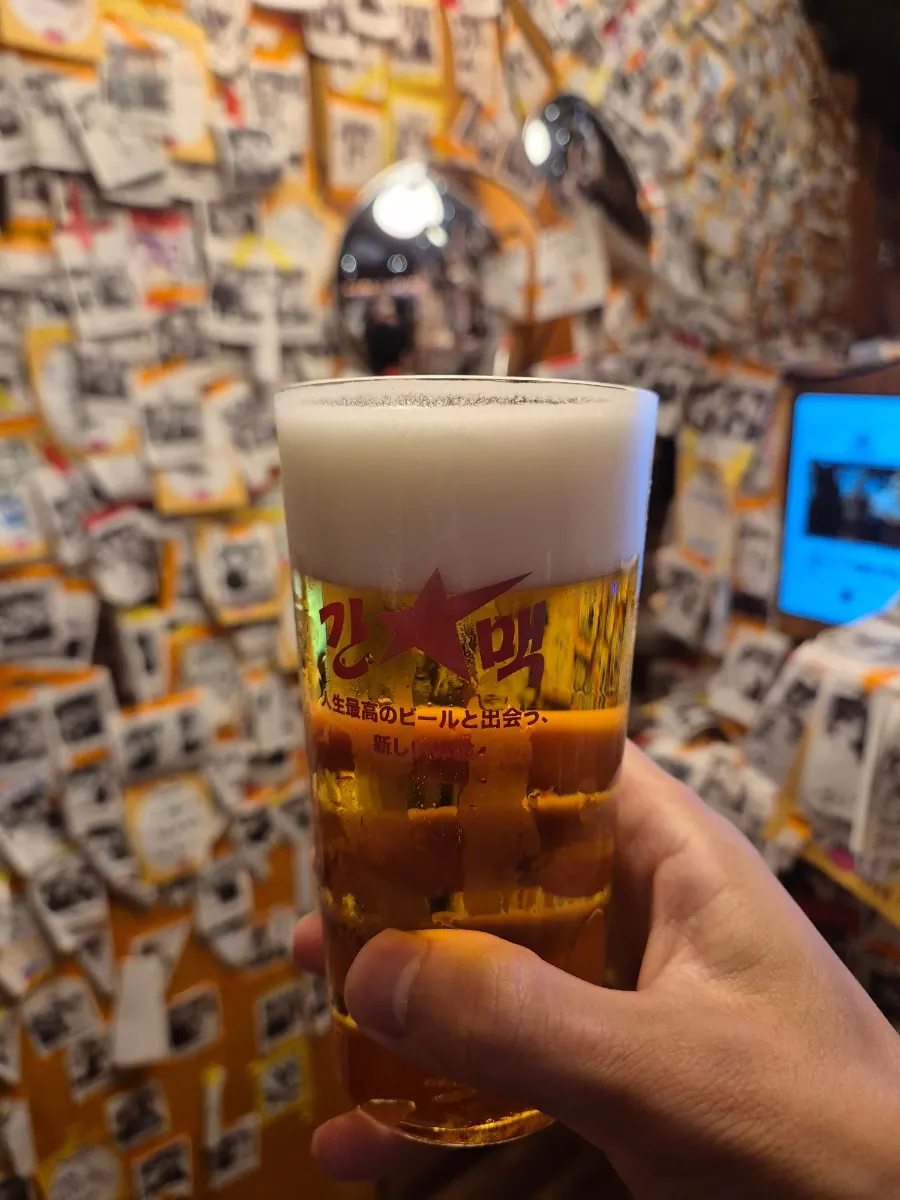 A glass of Sapporo draft beer won as a prize