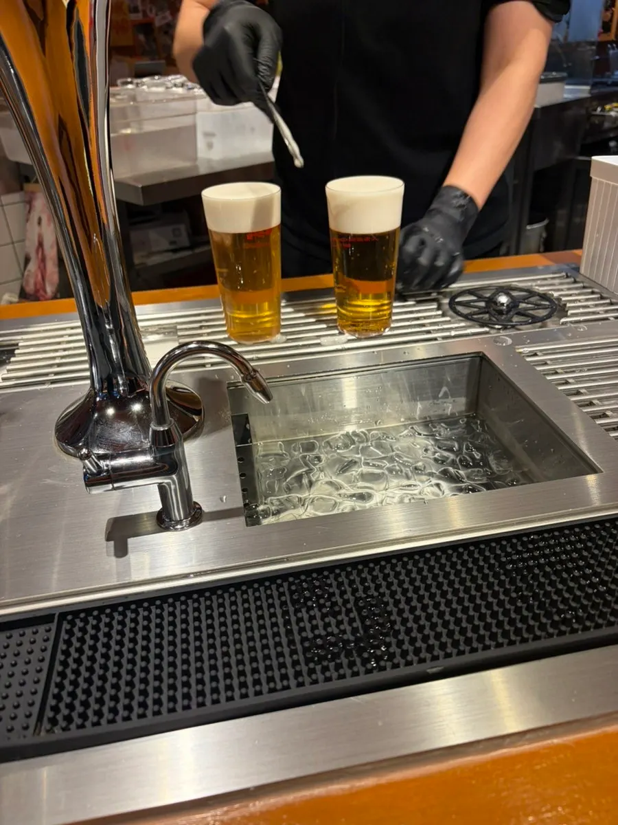 Dense cream-like foam on top of the draft beer
