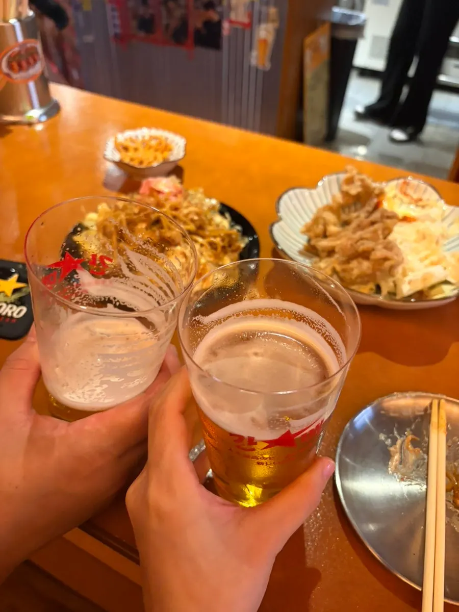 Yakisoba topped with bonito flakes and cabbage