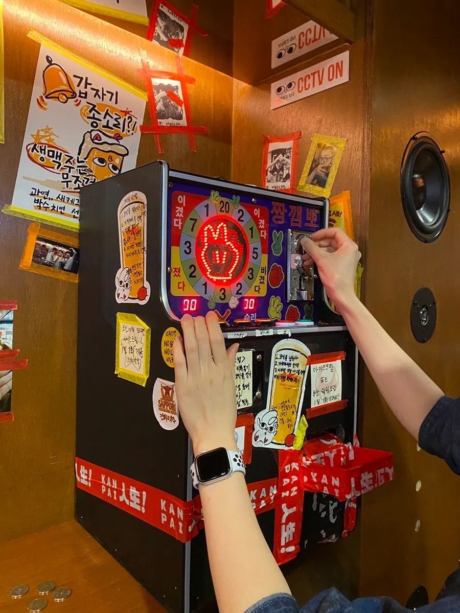 Playing rock-paper-scissors against the machine with coins