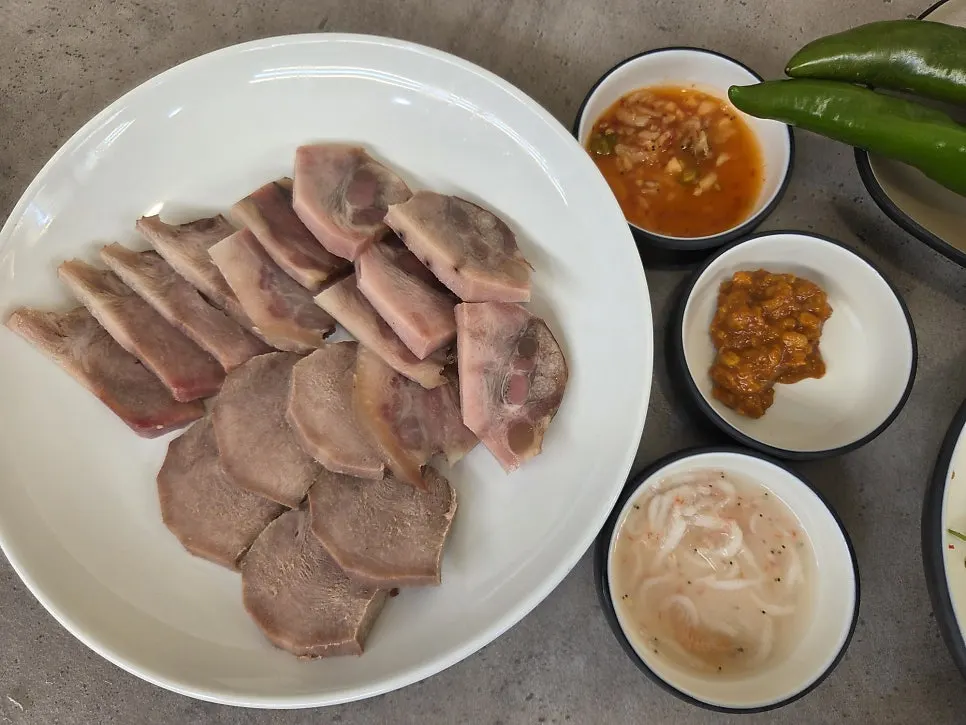A spoonful of sundaeguk ingredients lifted from the bowl