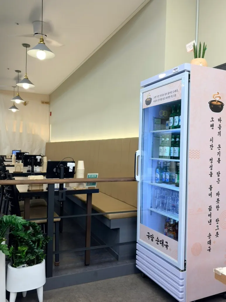 Wall-side seating farther inside the restaurant