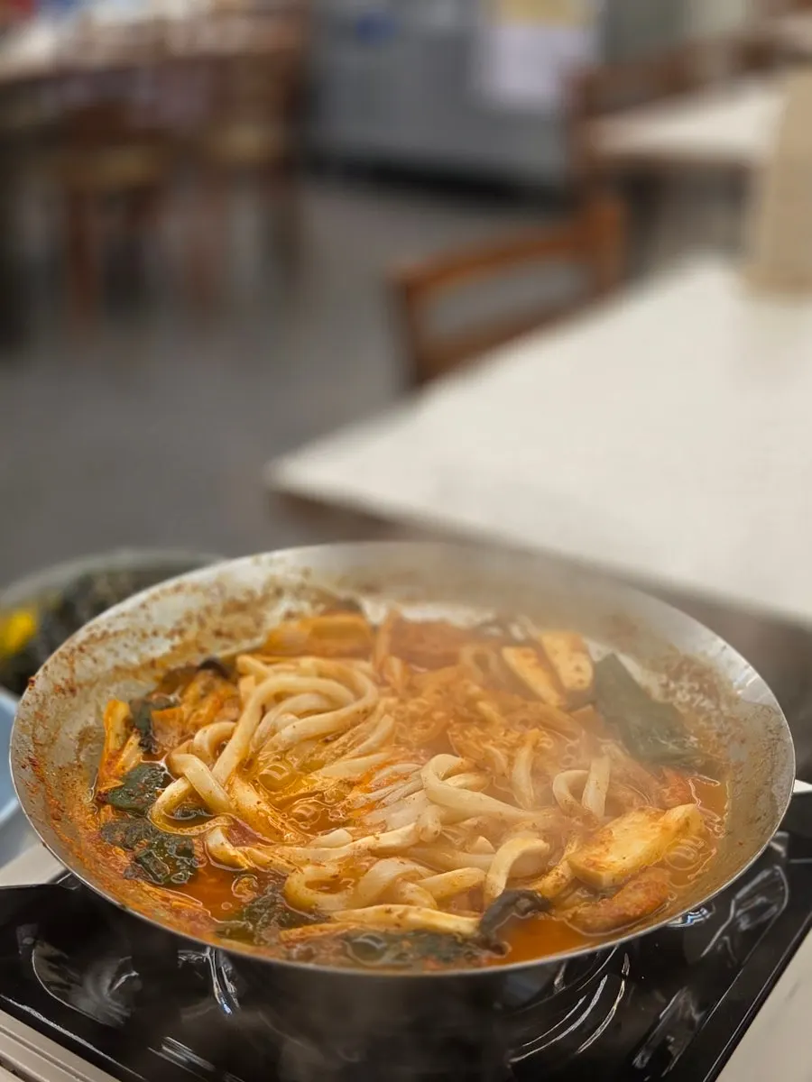 Extra udon noodles added to tripe hot pot