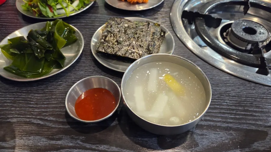 Minari salad and dried perilla leaf among Gapmaejeong's side dishes