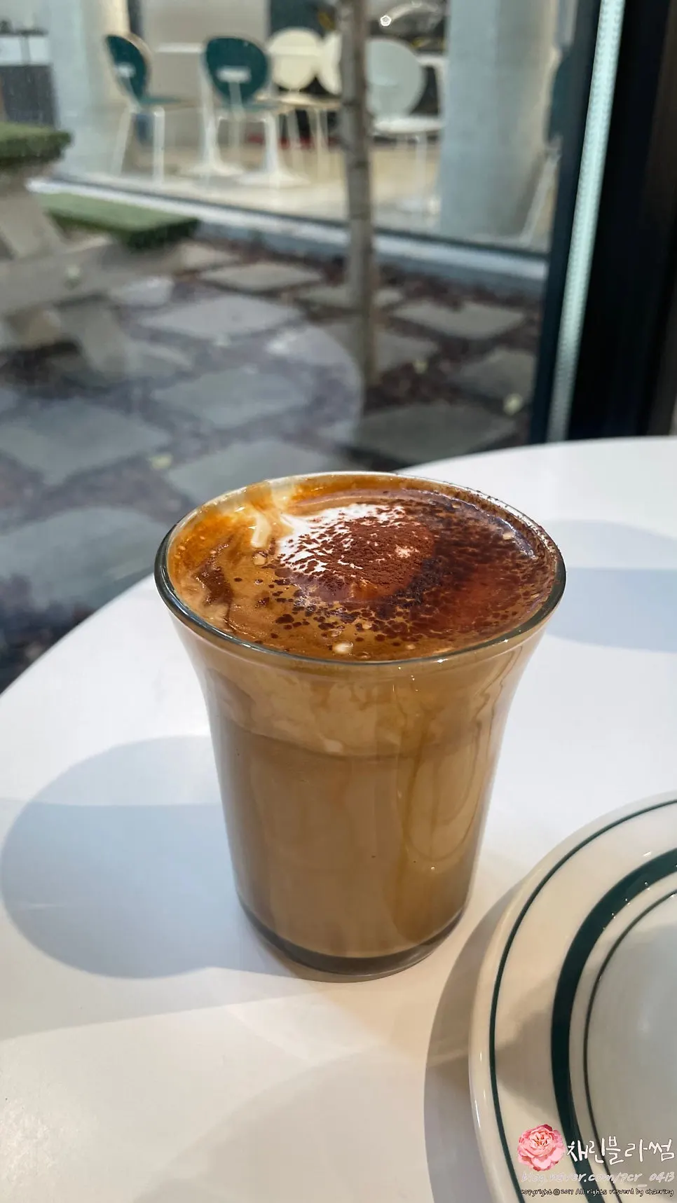 Signature coffee topped with pine nut cream