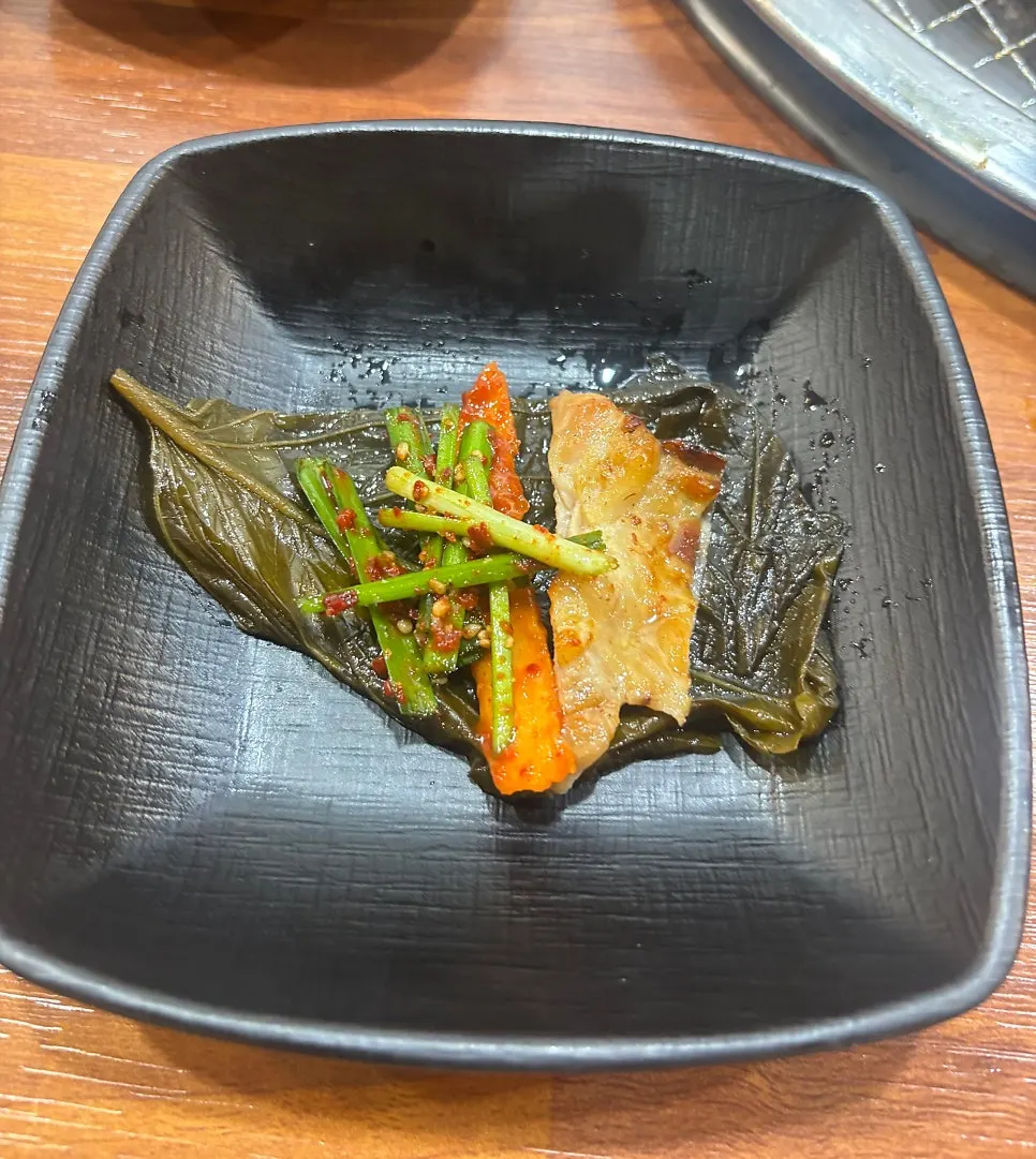 Half-and-half dakgalbi grilled over charcoal